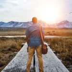 shallow-focus-from-male-standing-pathway-middle-grassy-field_optimized_150
