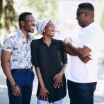three-afican-american-people-talking-street_optimized_150